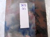 a picture of a piece of art with a tag on it