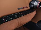 a close up of a car dashboard with a remote control