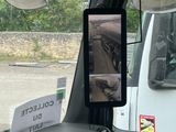 a picture of a truck driving down the road