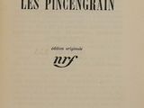 an open book with a black and white title on it