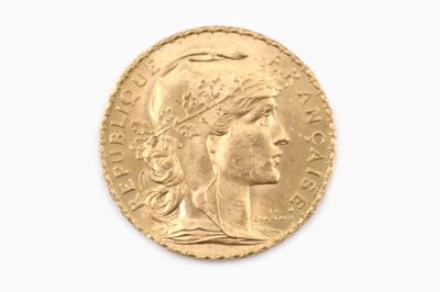l'image d'une pièce d'or sur laquelle figure une tête de femme