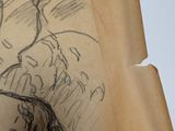 a drawing of a man riding a horse on a piece of paper