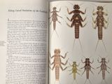 a book with a picture of insects on it