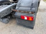 an image of a semi truck with a flatbed trailer
