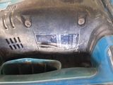 a close up of a drill on a table
