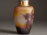 a vase with a picture of an angel on it