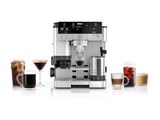 a close up of a coffee machine on a white surface