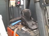 an image of a forklift with a seat in the back