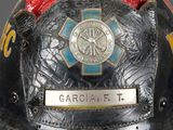 a close up of a fireman ' s helmet on display