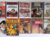 beaucoup de livres accrochés au mur