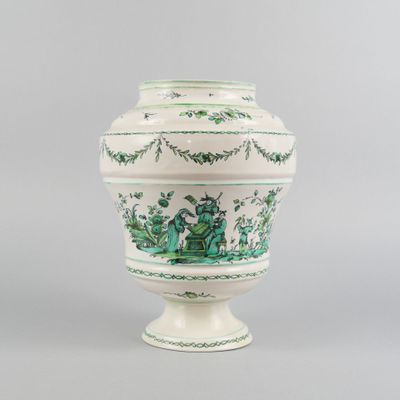 an image of a green and white vase on a gray background