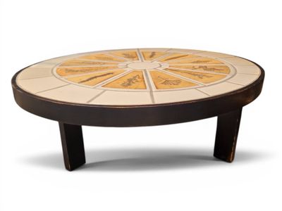 a coffee table with a circular design on top of it