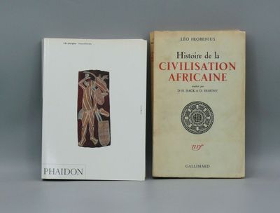 two books sitting next to each other on top of a table