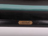 a close up of the label on the back of a black suitcase
