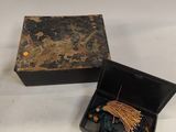 a small box that has some kind of jewelry inside of it