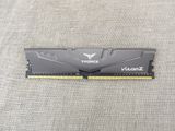 a close up of a memory module on a gray surface