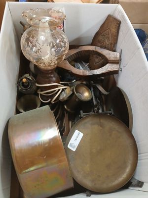 a box full of assorted items sitting on the floor