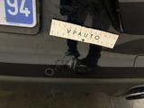 a sticker on the back of a car that says vauto