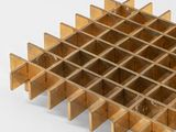 a wooden wine rack that has a lot of wine in it