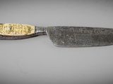 a knife that is sitting on a table