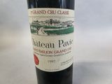 a bottle of wine that is sitting on a table
