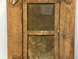 an old wooden picture frame with a window on the inside of it