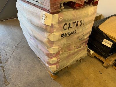 a large stack of boxes sitting on a pallet in a warehouse