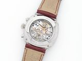 an image of a close up of a wrist watch on a white surface