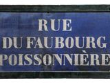 blue sign with white writing on it stating rue du faubourg possonnere