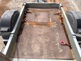 an image of a trailer with a chain attached to it
