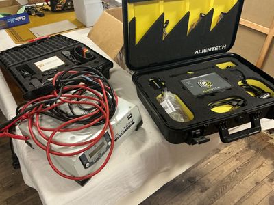 a black case with tools in it on a table