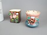 three vases that are sitting next to each other on a table
