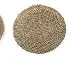 an image of a ball and a button on a white surface