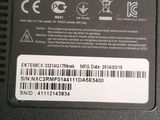 an image of a close up of a laptop charger on a table