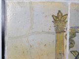 a picture of a tile with a picture of a column on it