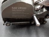 a close up of a metal object on a table