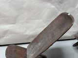 a small chair that is sitting on a table