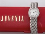 an image of a watch sitting on top of a red case