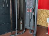 a gym equipment in the corner of a building