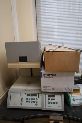 a box on top of a table with a laptop on it