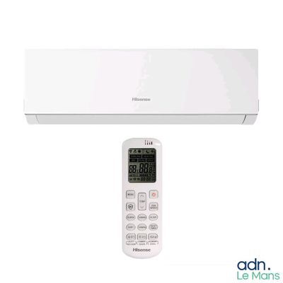 a close up of a remote control on a white wall mounted air conditioner