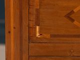 a close up of a piece of wood with a hole in it