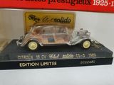 a model of a car on display in a glass case
