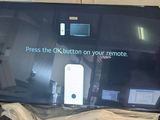 a tv screen with a message on it that says press the ok button on your remote