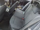 a car with a seat belt in the back of it