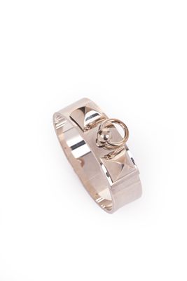 a close up of a ring on a white background