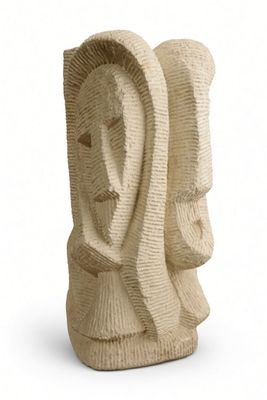 sculpture of a woman ' s face made of straw on a white background