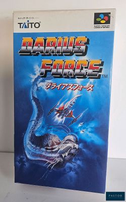 une image représentant une boîte de jeu vidéo sur laquelle figure l'illustration d'un dragon