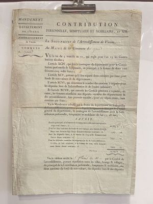 a piece of paper on a clipboard attached to a wall