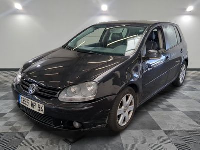 a picture of a black car parked in a garage